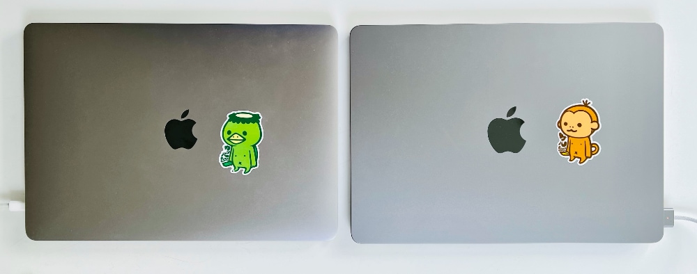 02016 MacBook Pro with Kappa Sticker and M2 02022 MacBook Air with Monkey Sticker.